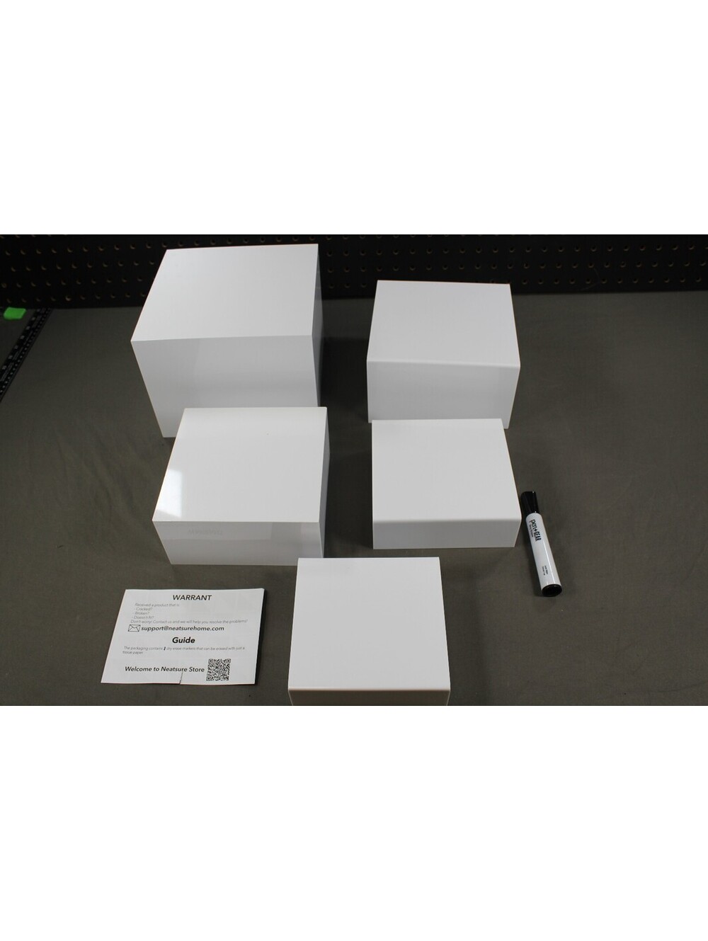 White Display Risers Set of 5 (One Small Crack)